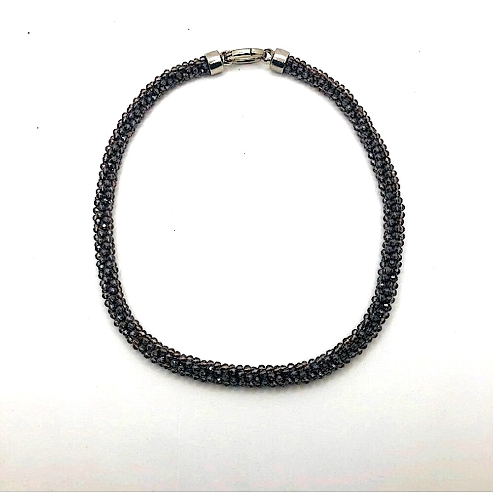 - Off brand necklace thats dark purple.